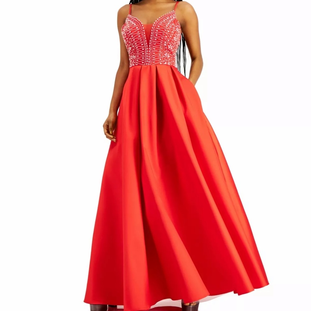 Beautiful red dress with sequins at the top! Fits beautifully!